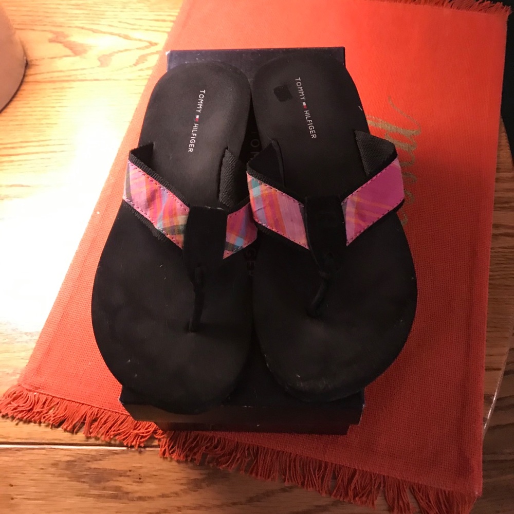 Tommy Hilfiger flip flops size 7.